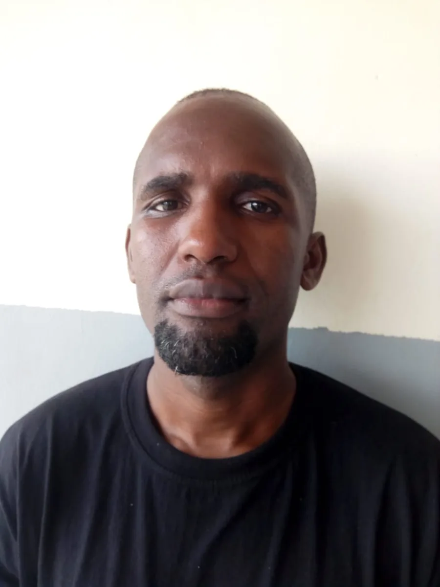 FREDRICK OLACHI SHITIALO, 44